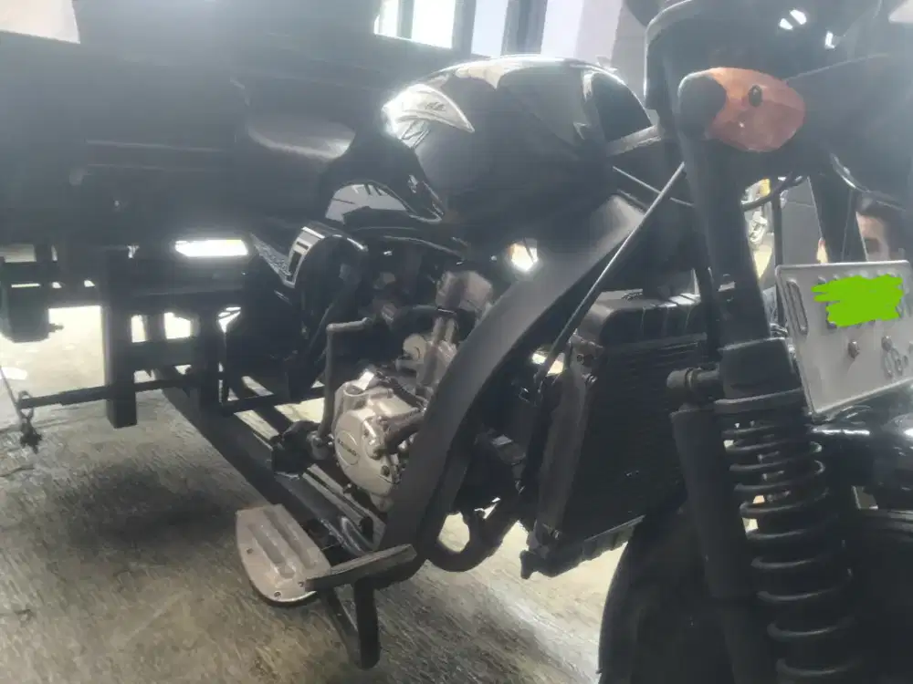 Kaisar triseda motor roda tiga