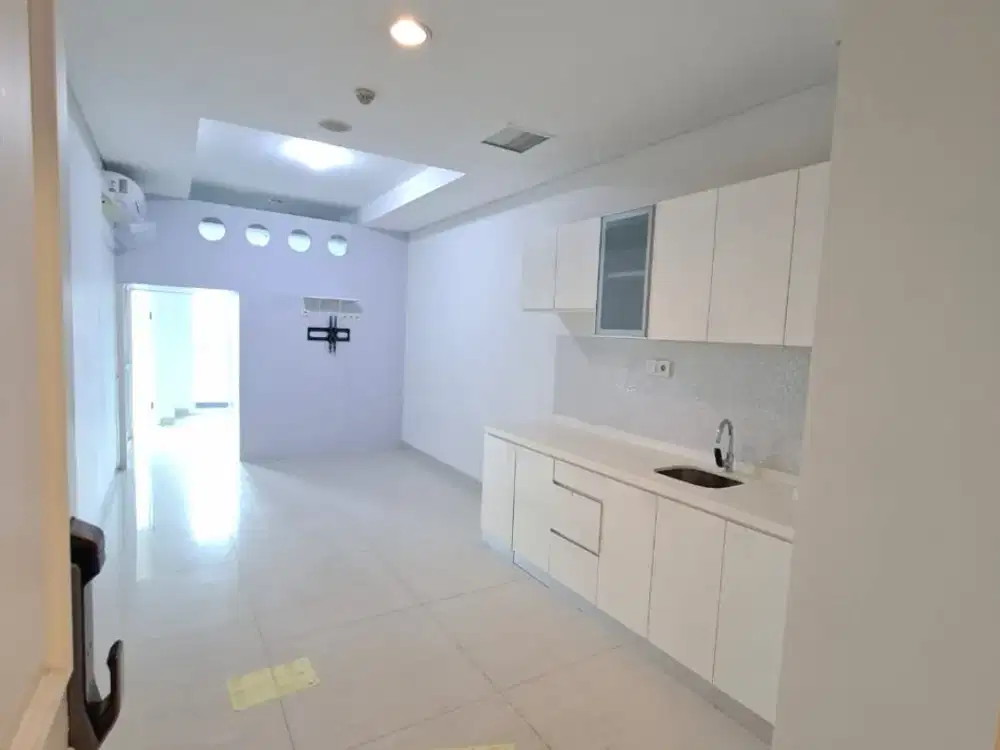 2BR Unfurnished Kondominium Grand Madison - Mall Central Park