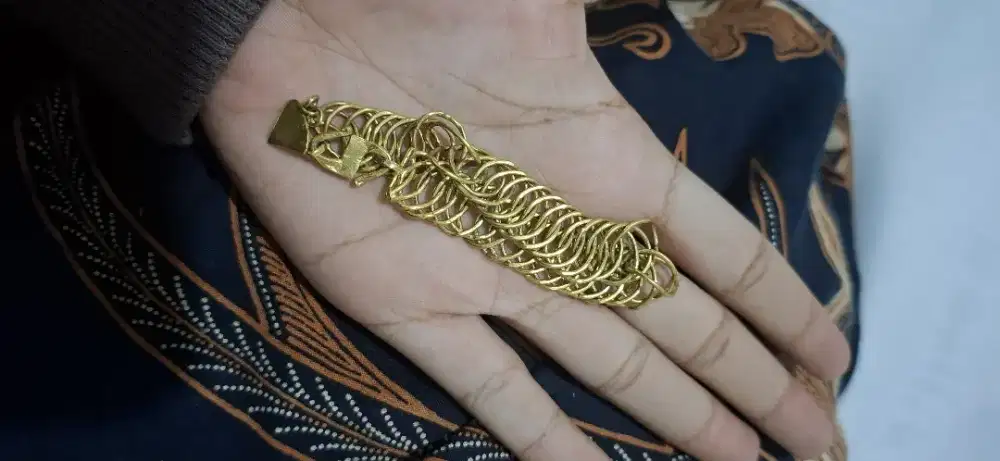 Terima emas kondisi apa pun