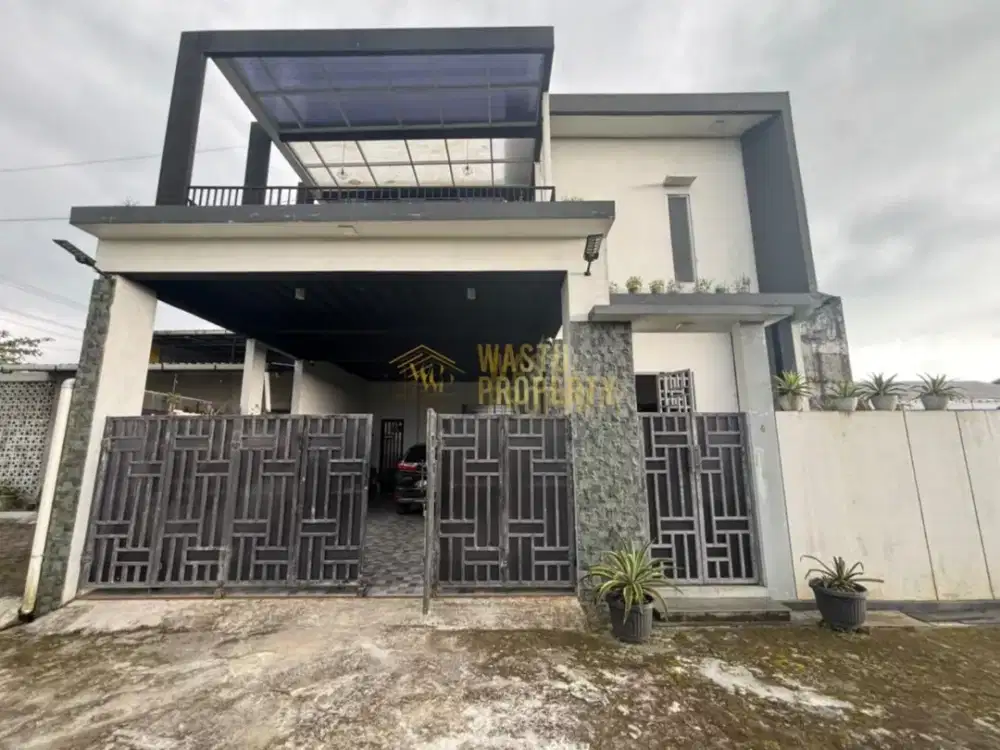 RUMAH MEWAH 2 LANTAI  CARPORT LUAS FULL FURNISHED AKSES STRATEGIS