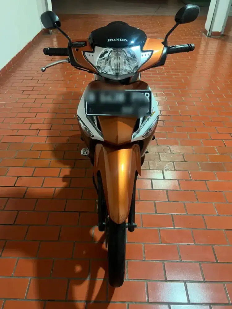 supra x 125 PGM Fi tahun 2006