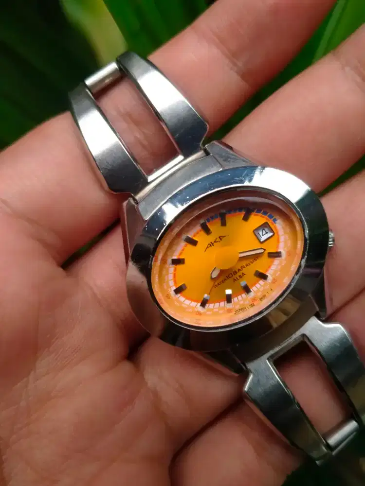 AKA ALBA LADY ORANGE DIAL KEKINIAN