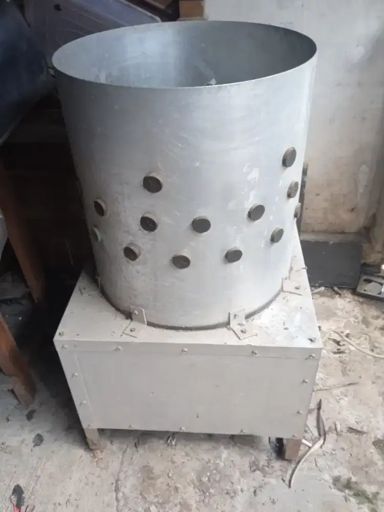 Pencabut bulu ayam dengan penggerak tenaga listrik 1Hp,, diameter 58cm