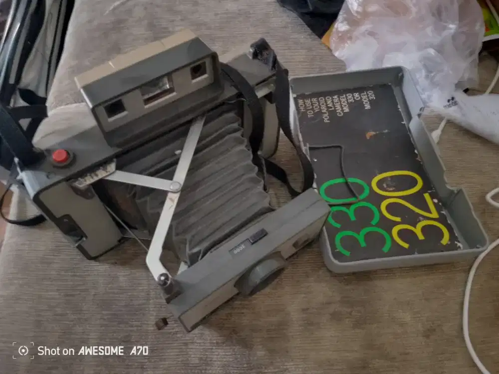 Kamera polaroid land camera 320 bekas lengkap dengan buku