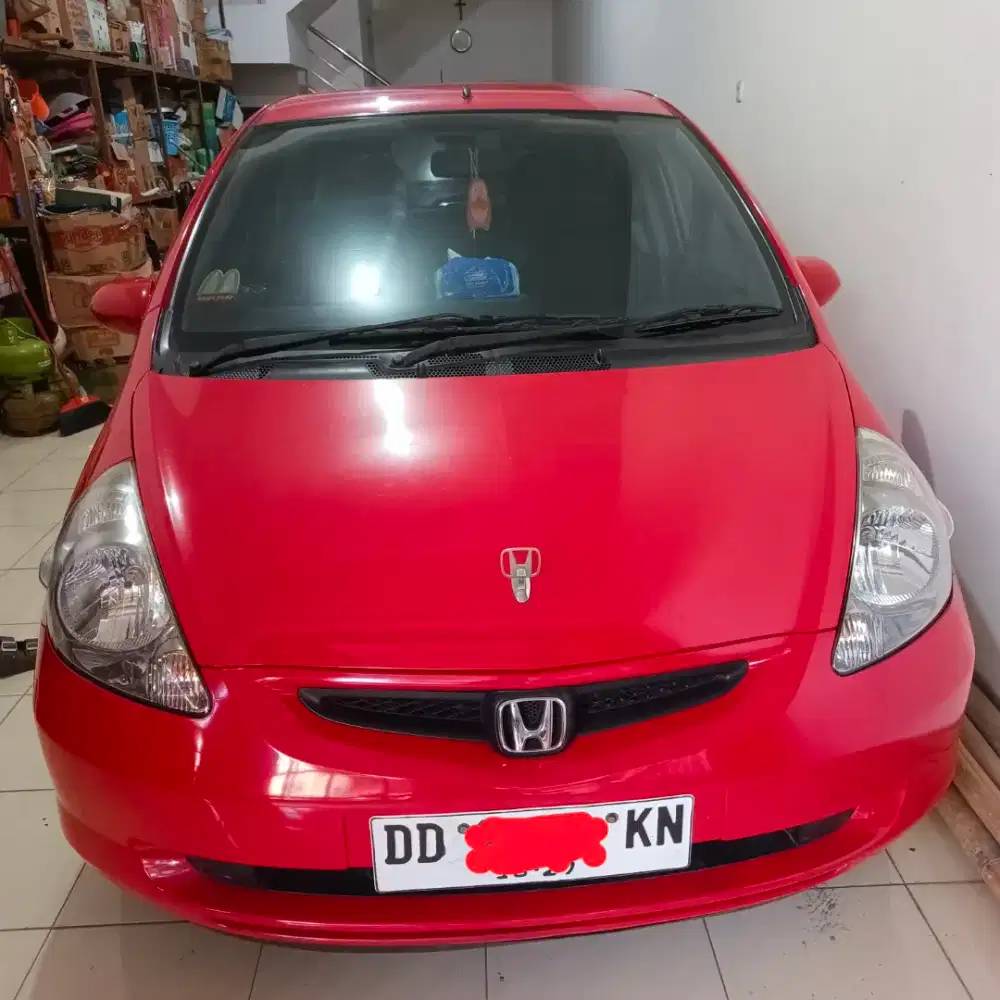 Honda jazz merah