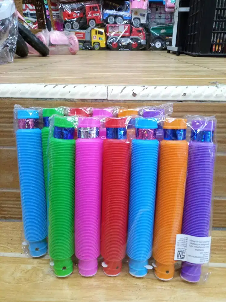 mainan anak poplightt hrga per pcs