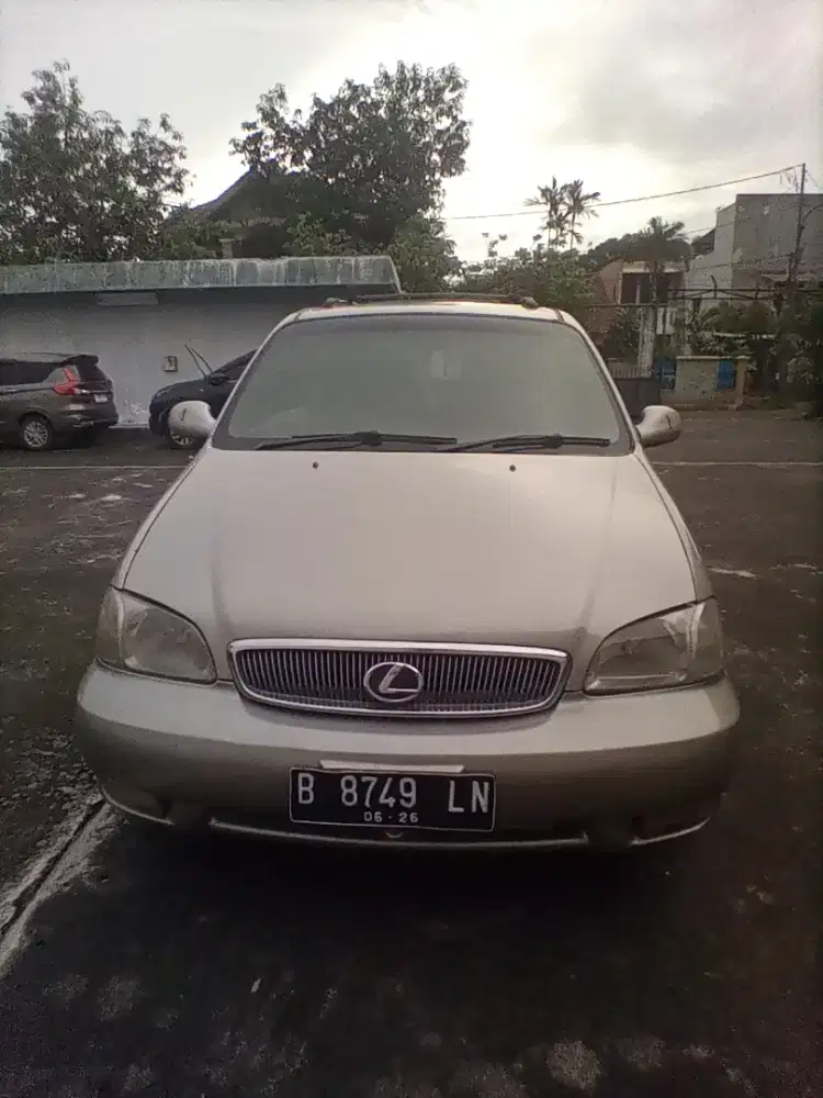 Bismillah numpang jual mobil kia carnival thn 2000 automatic