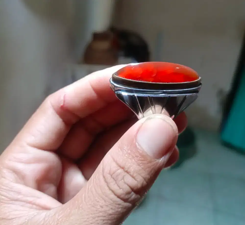 Batu akik pandan merah ada mines ada sule nya..