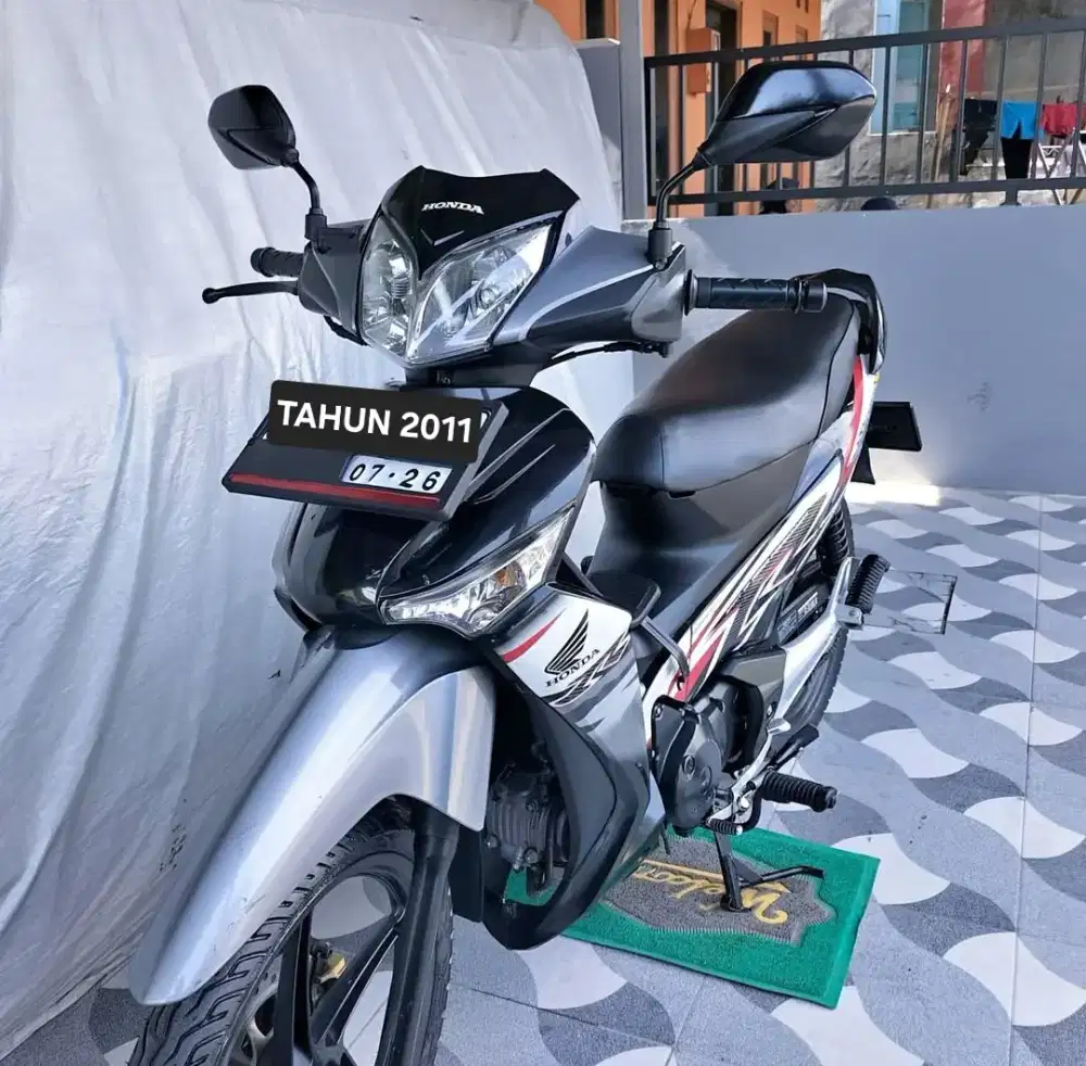 Supra x 125 karburator th 2011 pajak panjang nopol DEPOK