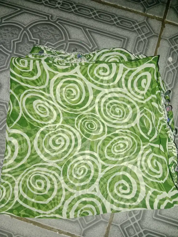 kerudung motif tidak terpakai