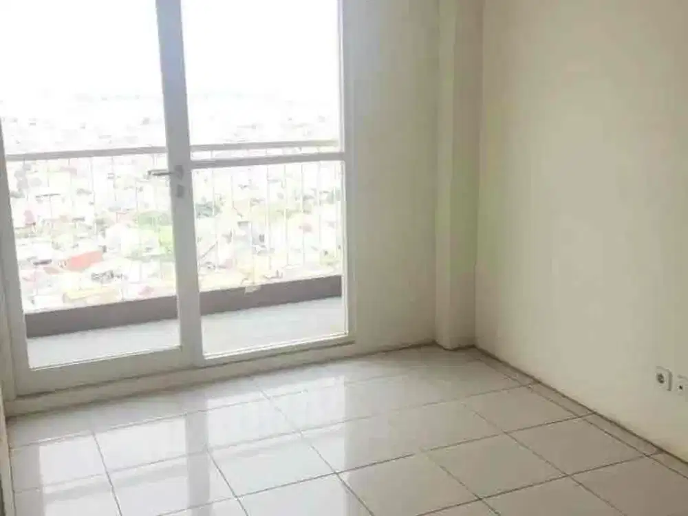 Jual Rugi Apartemen Puncak Dharmahusada 2 BR • 56 m²