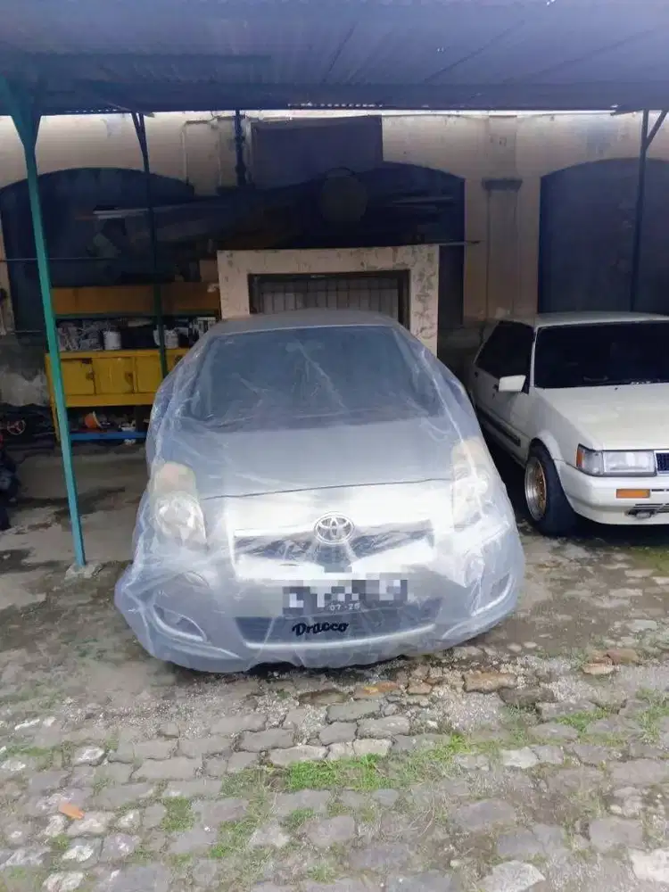cover mobil yaris transparan tebal awet waterproof dracco