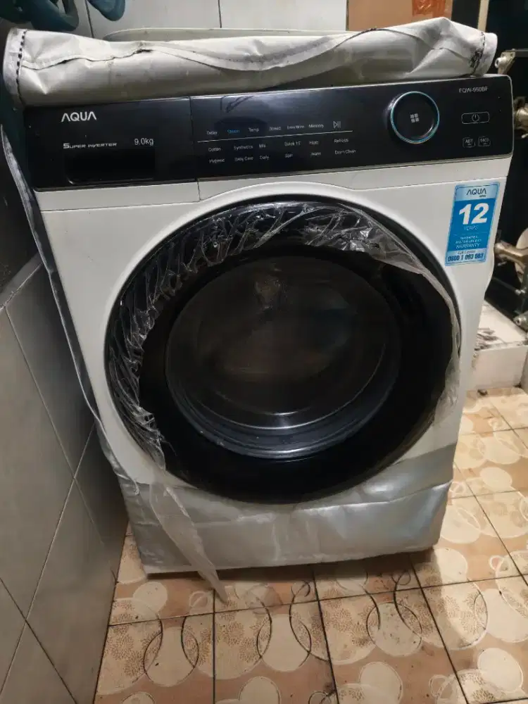 Mesin cuci otomatis front loading tutup samping / depan 9kg AQUA