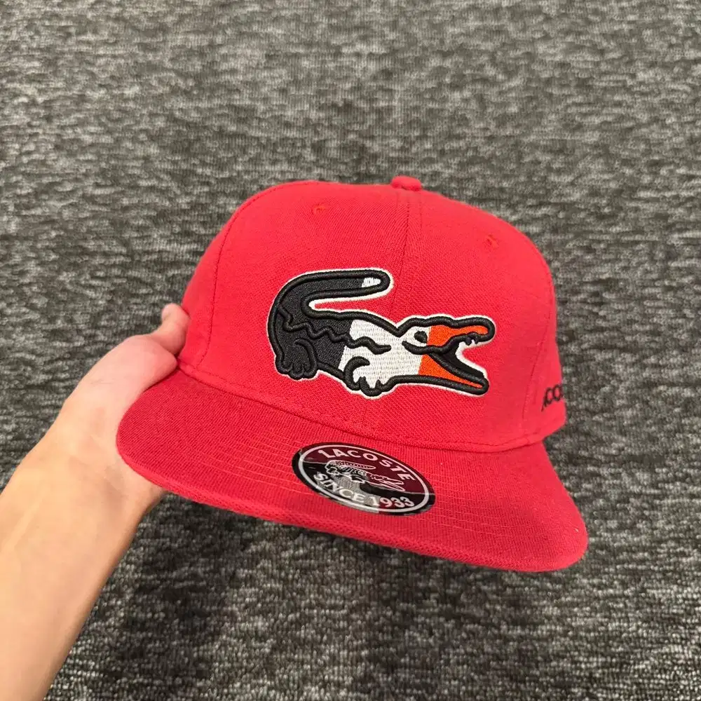Topi Snapback Lacoste Import