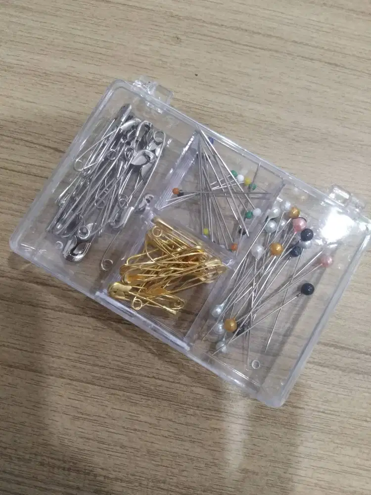 PENITI DAN JARUM PENTUL