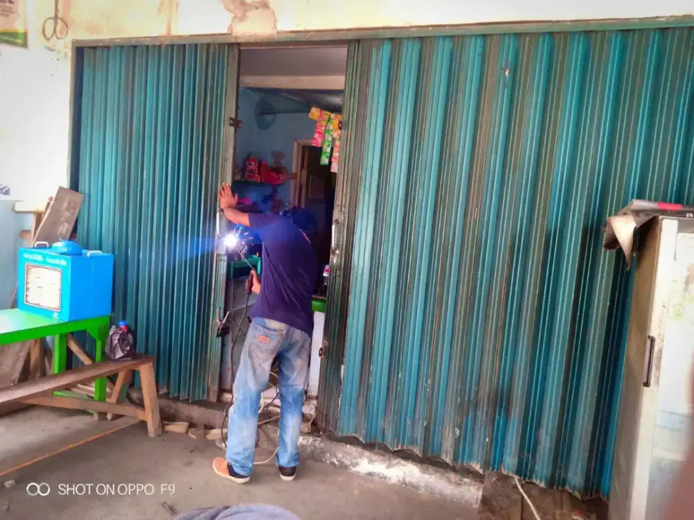 Service rolling door folding gate panggilan murah