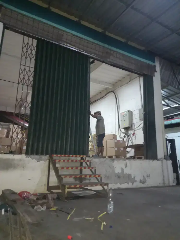 Tukang service rolling door murah