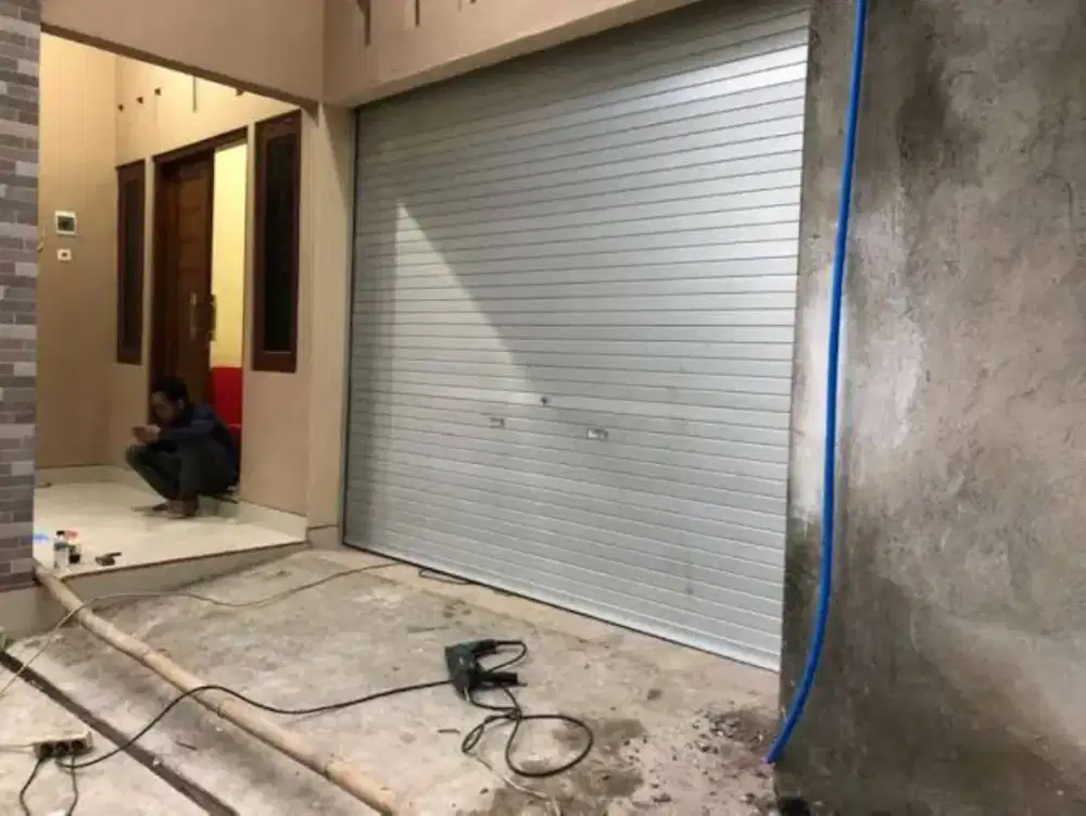 Tukang perbaikan rolling door folding gate murah