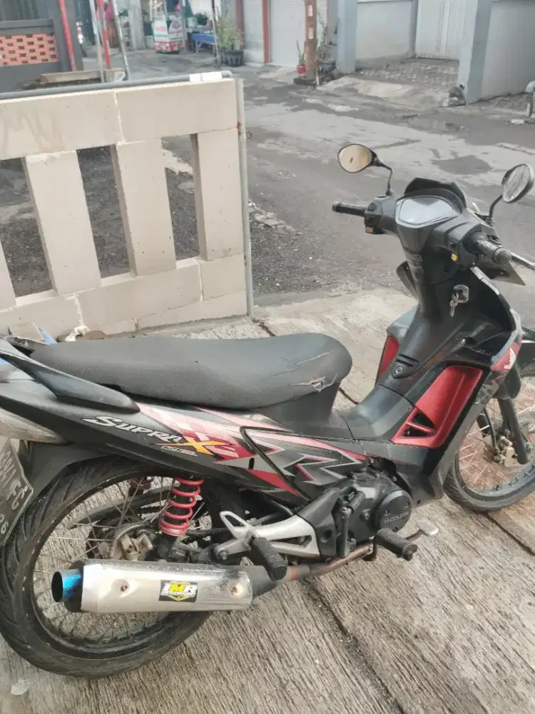 Jual supra x TR 125 karbu 2011..