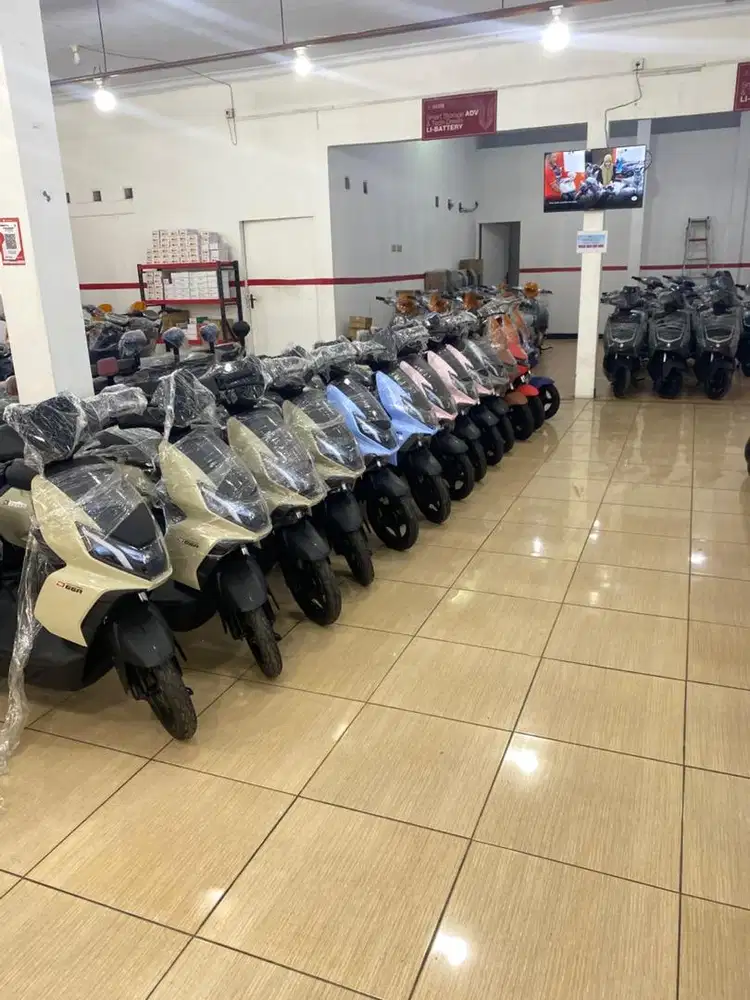 Sepada dan motor lustrik uwinfly