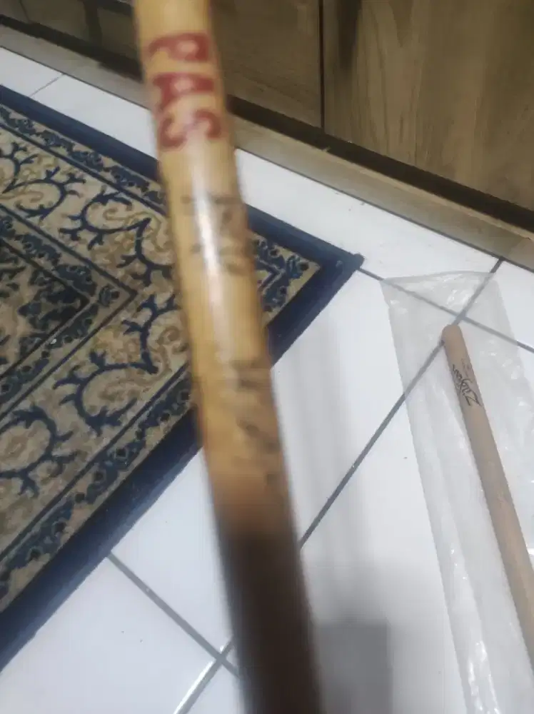 Stick drum plus tanda tangan