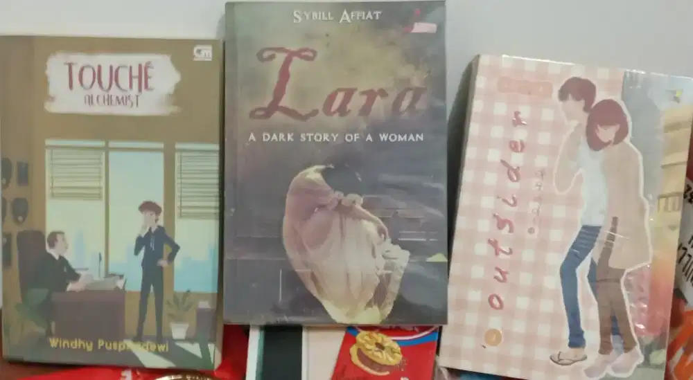 Buku novel (a dari story of woman), (touche alchemist), (outsider)