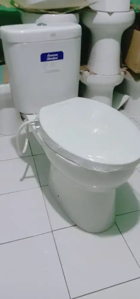 Kloset duduk mrek American standart Newton smart washer.