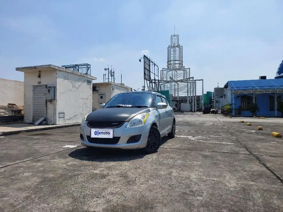 TDP 7,JT Suzuki Swift 1.4 GX Bensin-AT Abu 2014