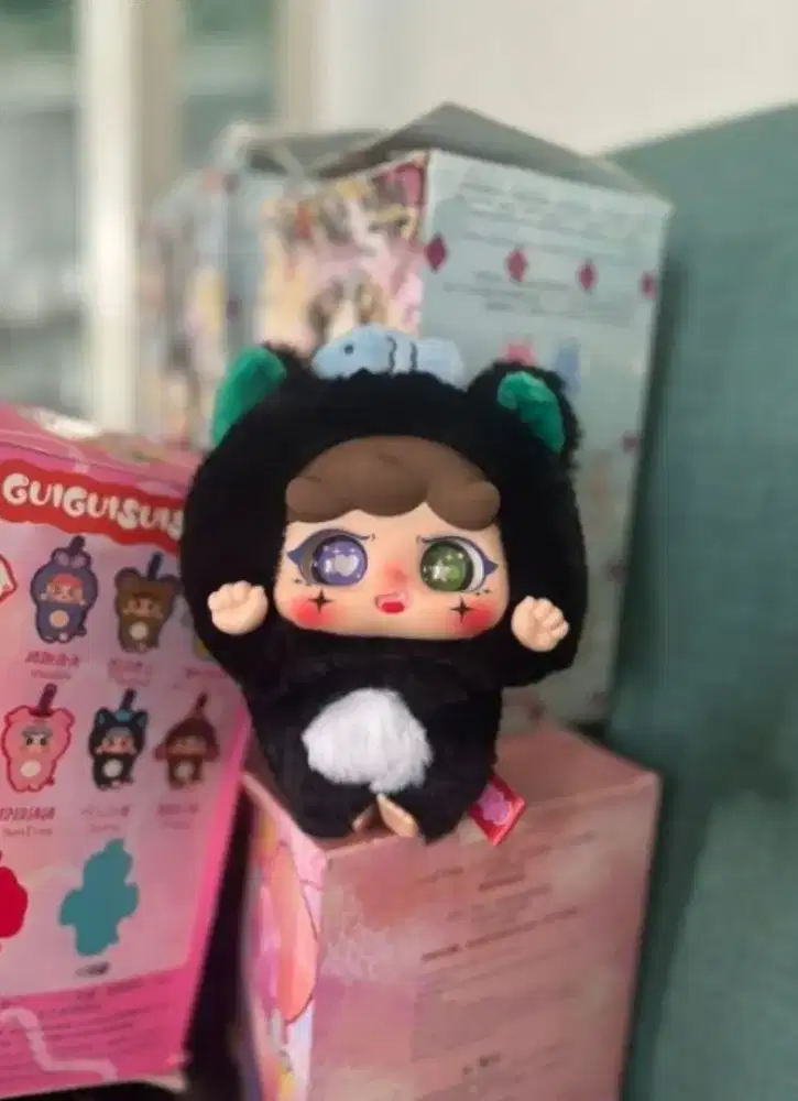 Boneka gantungan tas migo