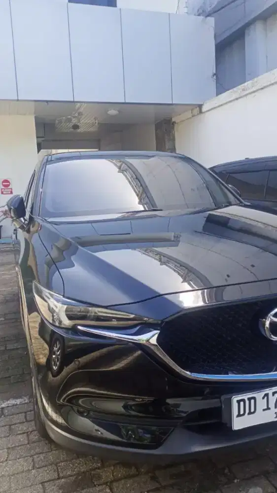 Mazda CX-5 2021 Bensin hitam istimewa.