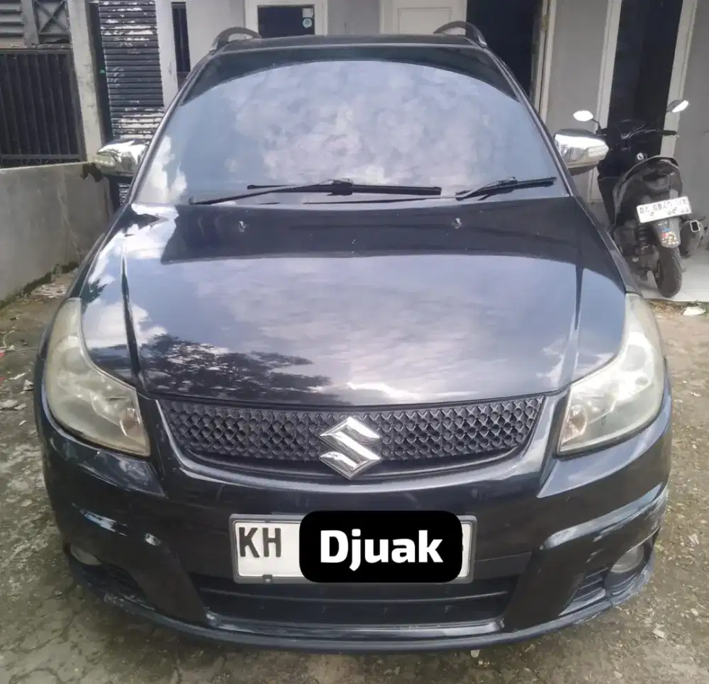 Dijual sambil di pakai susuki X.over tipe tinggi Manual surat lengkap