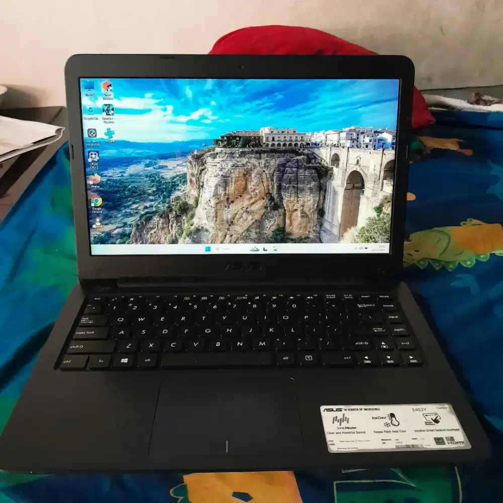Laptop Asus X402Y Slim. Baterai awet