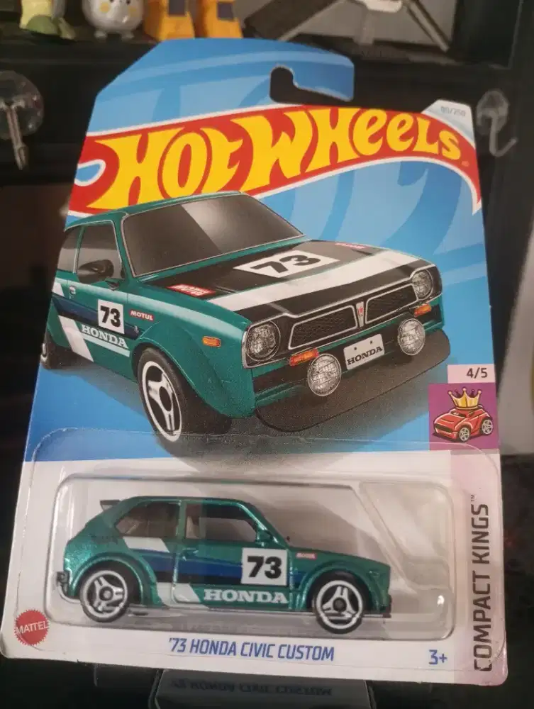 Hot Wheels '73 Honda Civic Custom die-cast car.