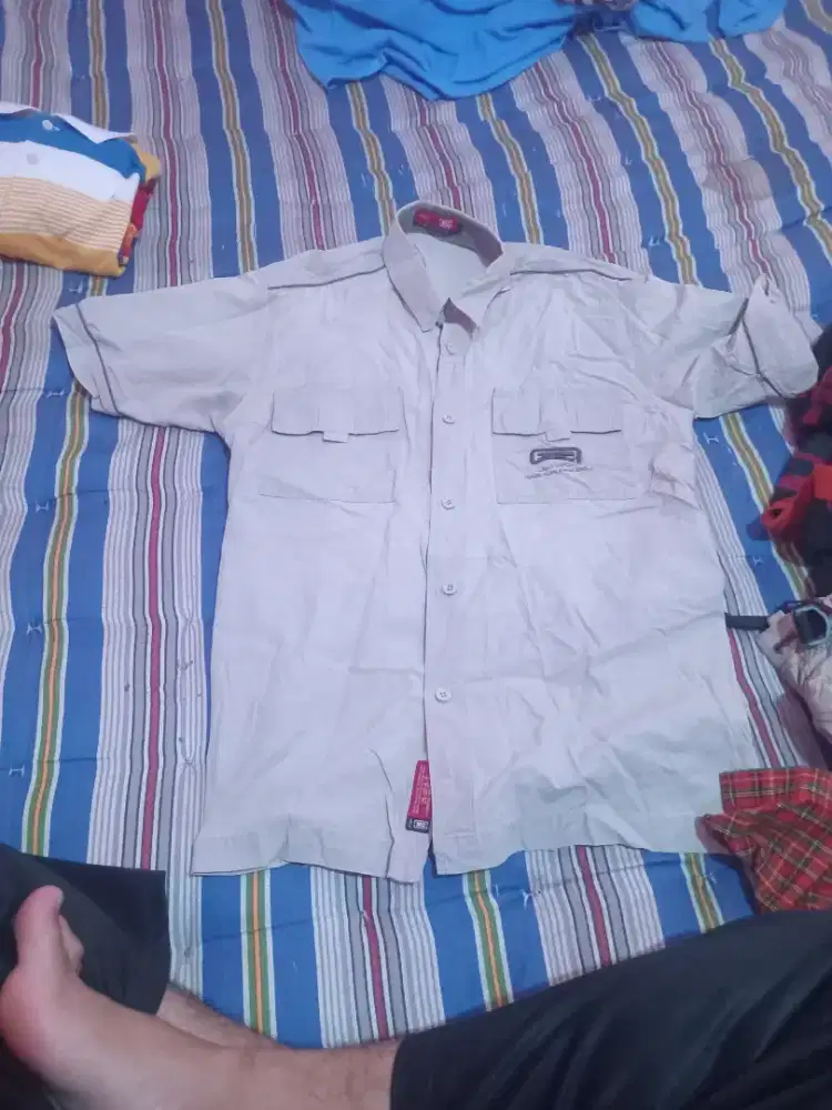 kemeja cargo exposure