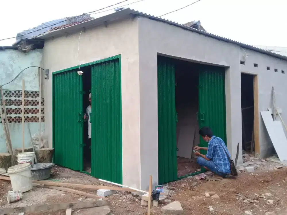 Rolling door toko dan folding gate besi