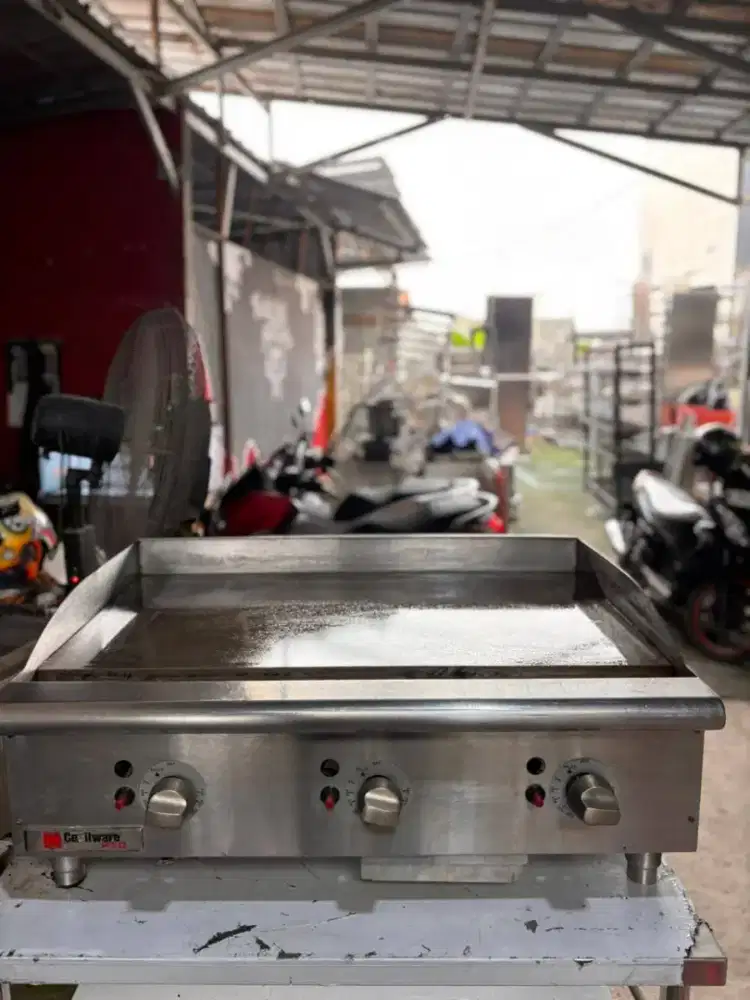 Teppanyaki gas/gas griddle countertop Merk Cecilware pro
Termostat on