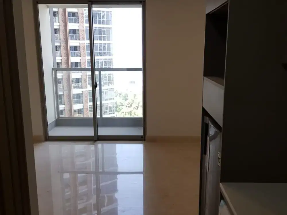 sewa apartemen gold coast PIK tipe studio kosongan