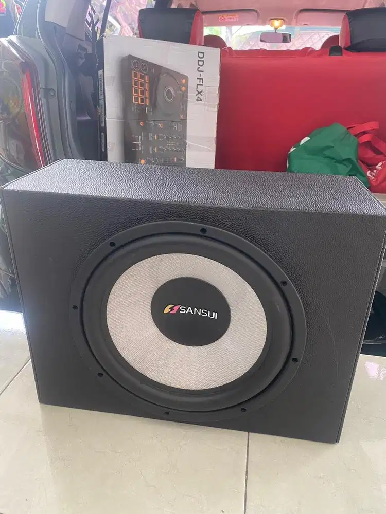 Subwoofer mobil merk sansui
