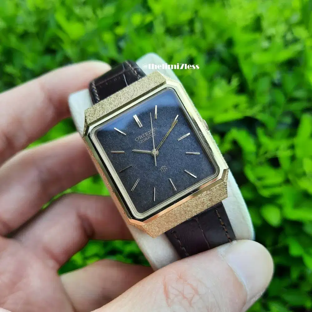 Jam tangan Orient quartz GP tank gold plated dengan black snow dial