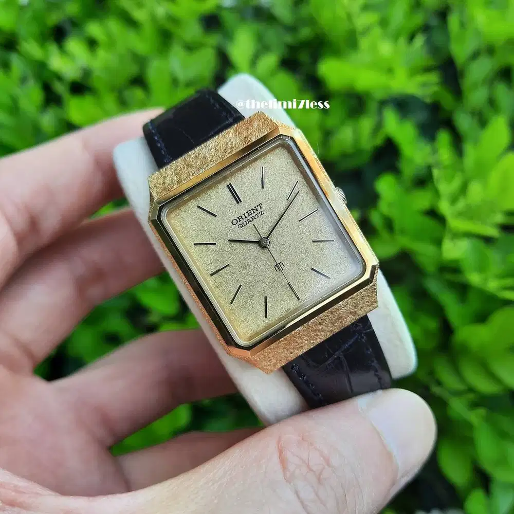 Jam tangan Orient quartz GP tank gold plated dengan gold snow dial