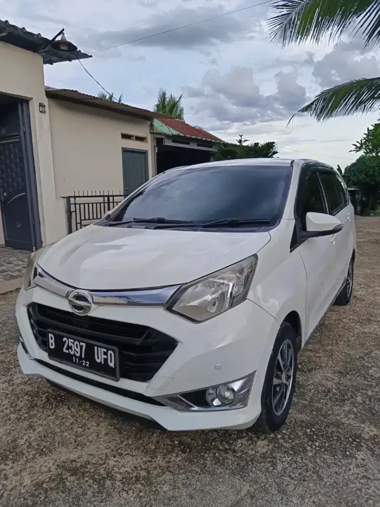 Sigra R deluxe otomatic