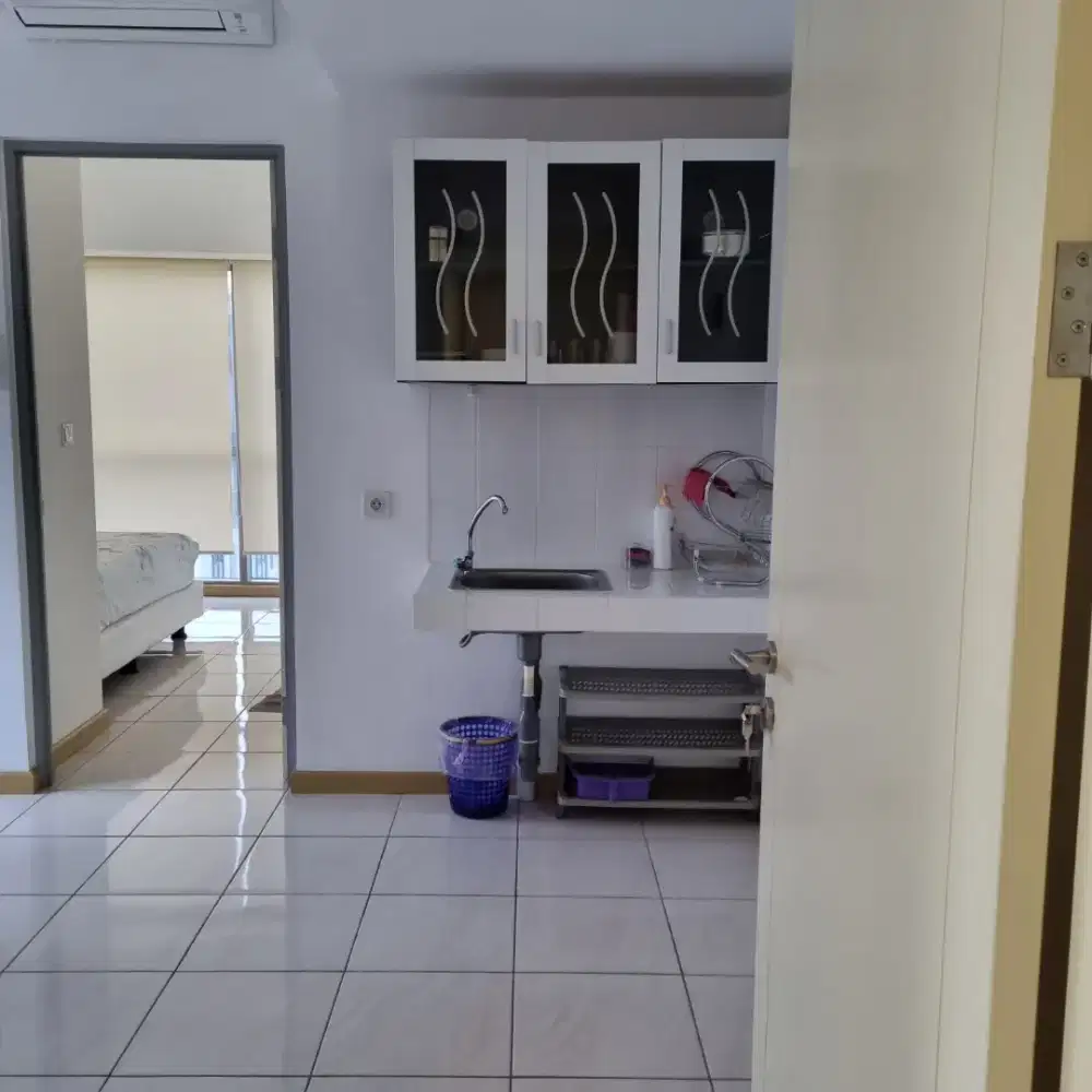 JUAL RUGI APPARTMENT MTOWN 1BR TOWER CARMEL