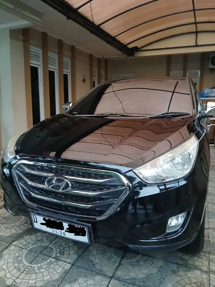 Hyundai Tucson Hitam AT 2.0 Bensin Mulus Siap pakai
