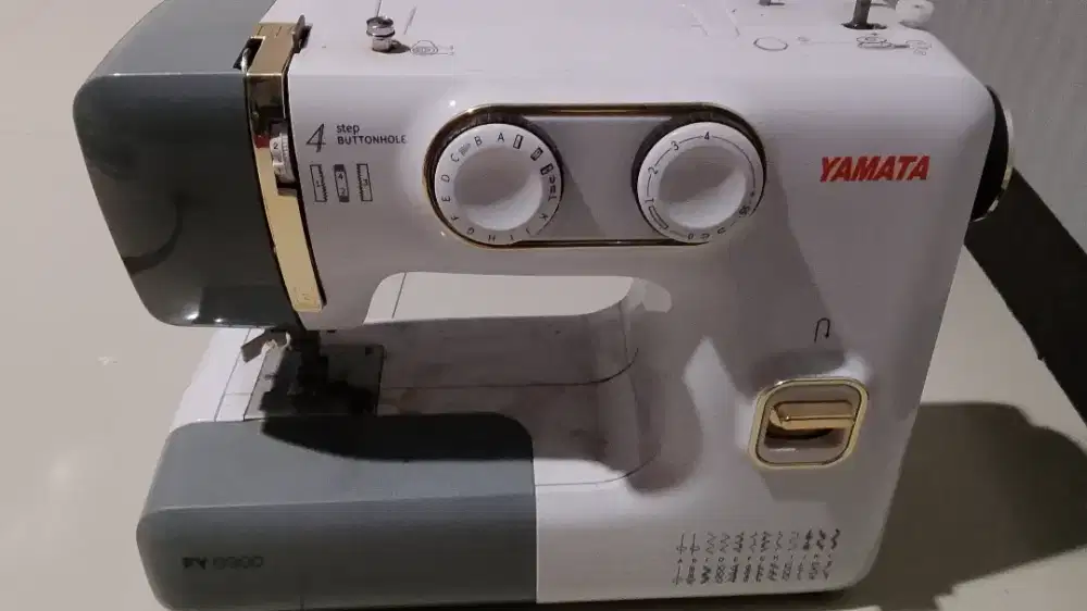 Mesin jahit portable sekelas singer