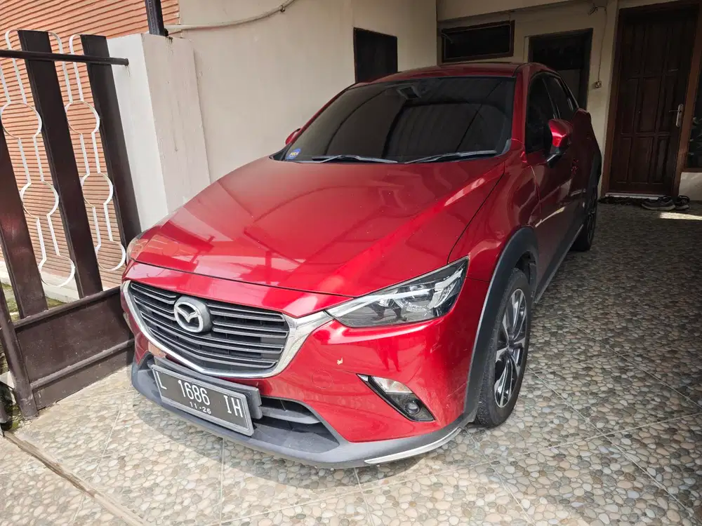 Mazda CX-3 1.5 (2021) warna merah (favorit) pemakaian wanita