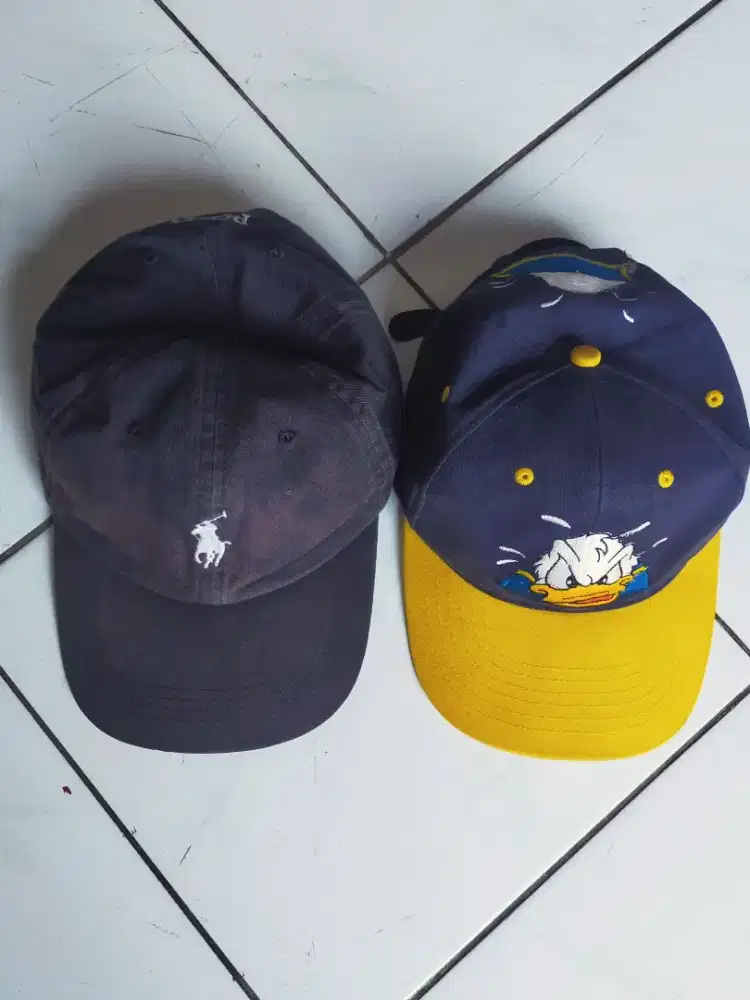 topi polo & donald duck bekas