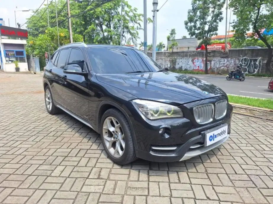 LOW DP BMW X1 2.0 sDrive18i Bensin-AT 2014 JMA