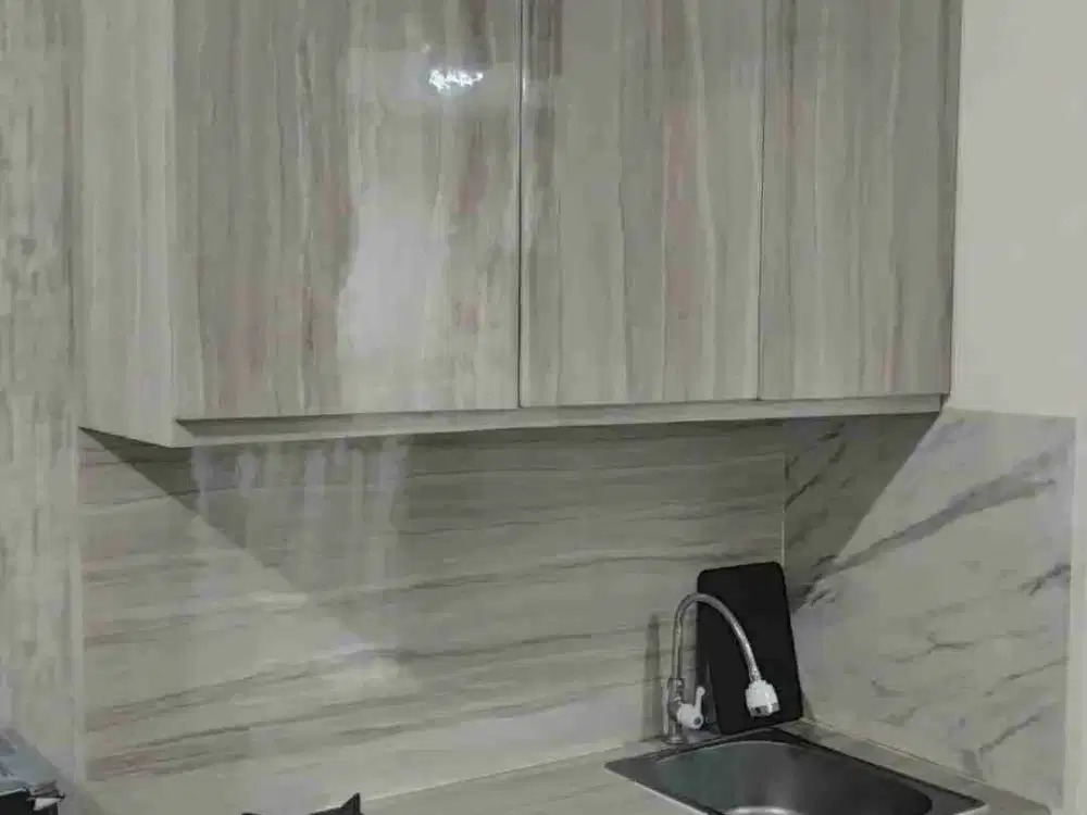 disewakan atau jual apartemen gunawangsa merr type studio full furnish