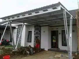 Pemasangan kanopi rumah rangka baja ringan atap spandek pasir