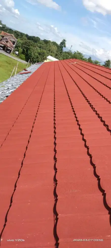 Baja atap genteng metal pasir